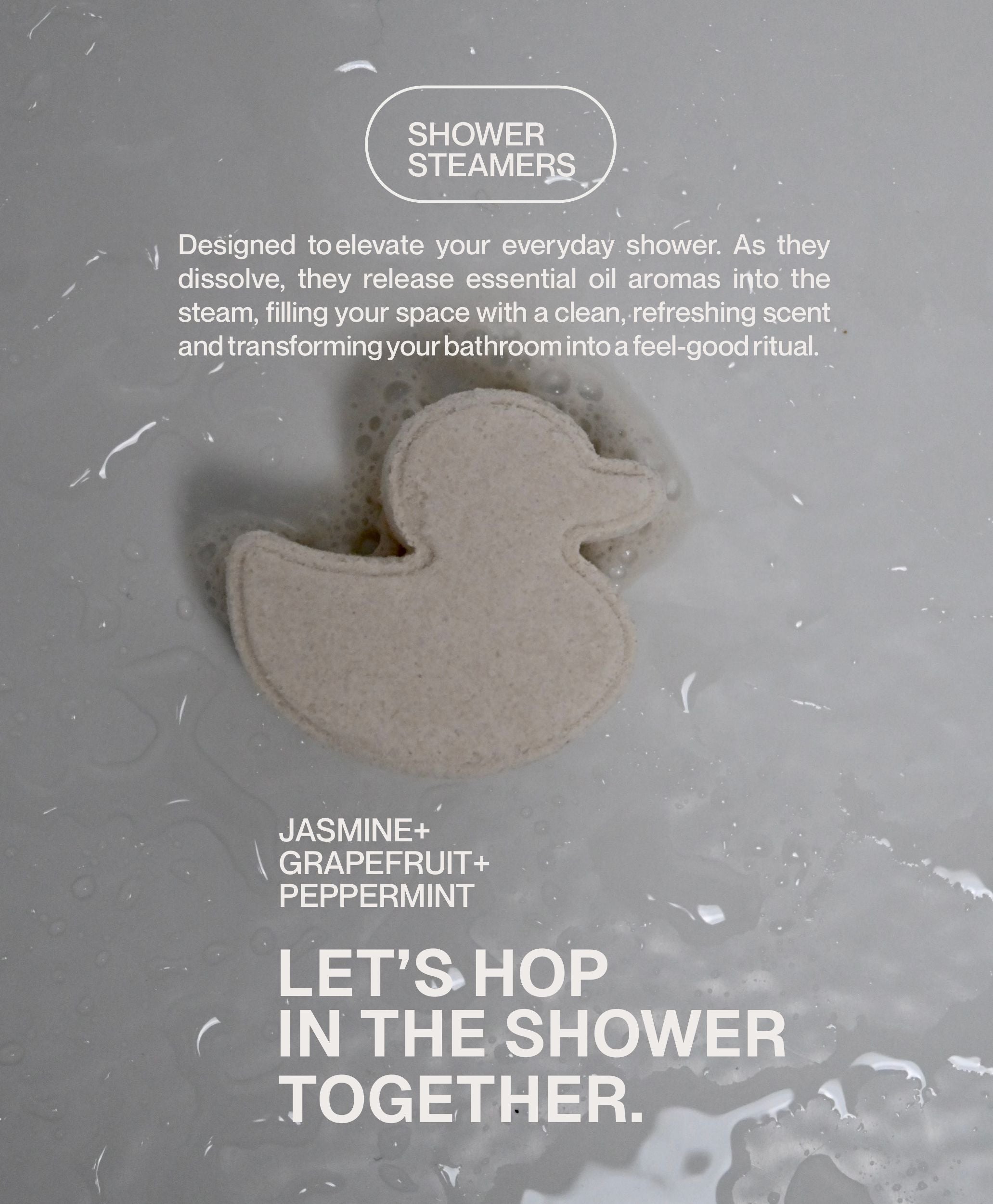 Duck-shaped shower steamers releasing essential oil aromas in steam