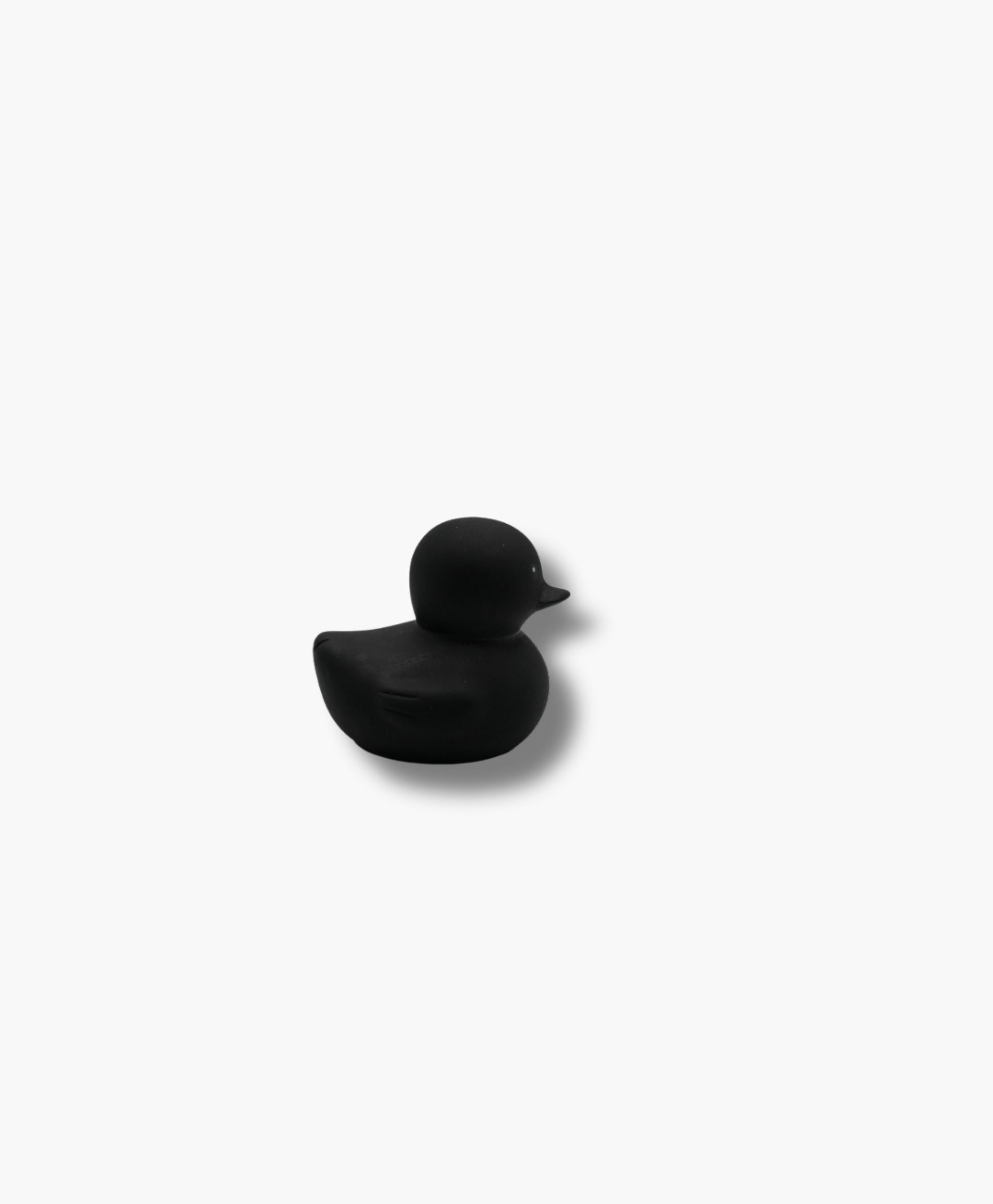 The Iconic rubber duck toy on neutral background