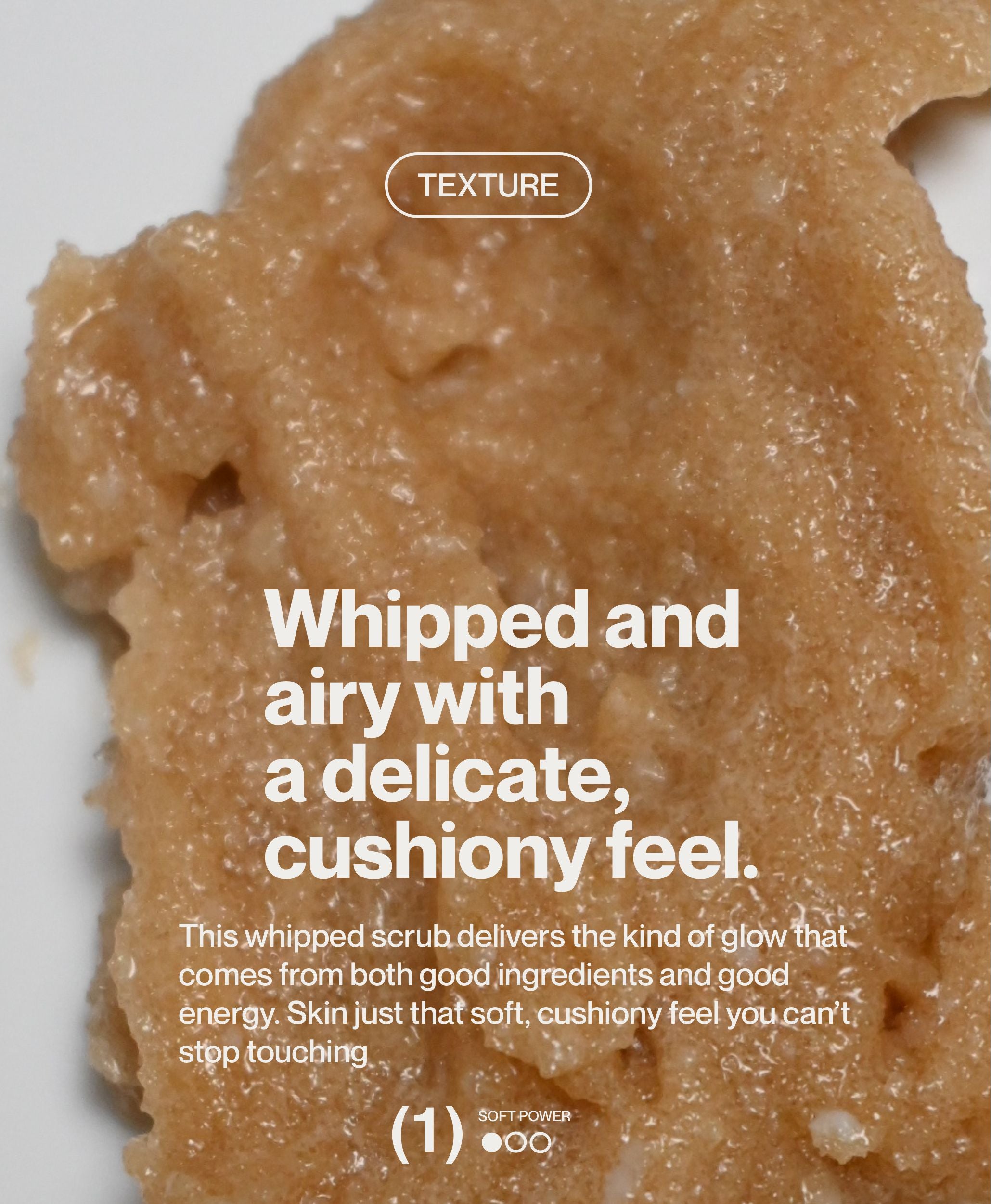 Close-up of whipped body scrub texture with airy cushiony exfoliating finish